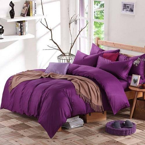 100% Cotton Duvet Cover Set in the color violet purple with matching violet purple pillowcases in a full bedroom setup - Fluffyslip