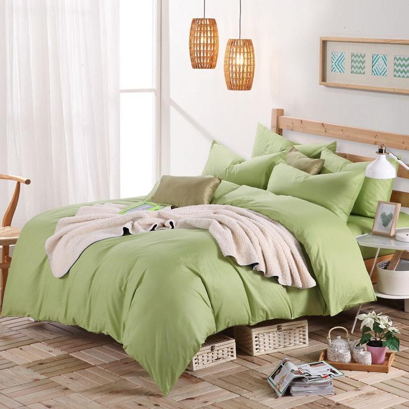 100% Cotton Duvet Cover Set in the color mint green with matching mint green pillowcases in a full bedroom setup - Fluffyslip