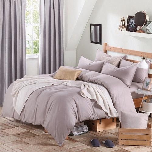 100% Cotton Duvet Cover Set in the color taupe with matching taupe pillowcases in a full bedroom setup - Fluffyslip