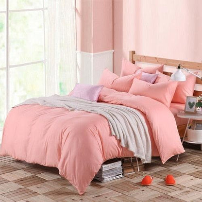 100% Cotton Duvet Cover Set in the color soft pink with matching soft pink pillowcases in a full bedroom setup - Fluffyslip