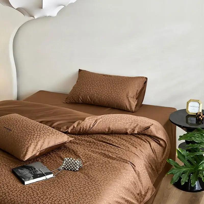600TC Egyptian Cotton Diamond Wave Pattern Duvet Set in brown with a fashion handbag and jewelry at the foot of the bed - Fluffyslip