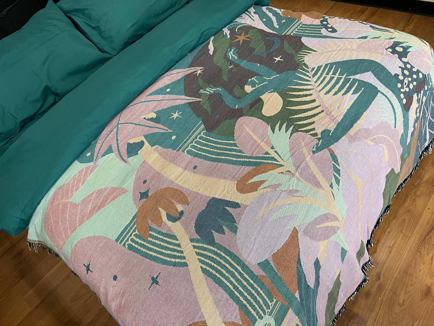 inside of Forest Dancer Throw Blanket -130x160cm Vibrant rainforest illustration with dancing woman and leopard. Lightweight and durable polyester/cotton blend - Fluffyslip