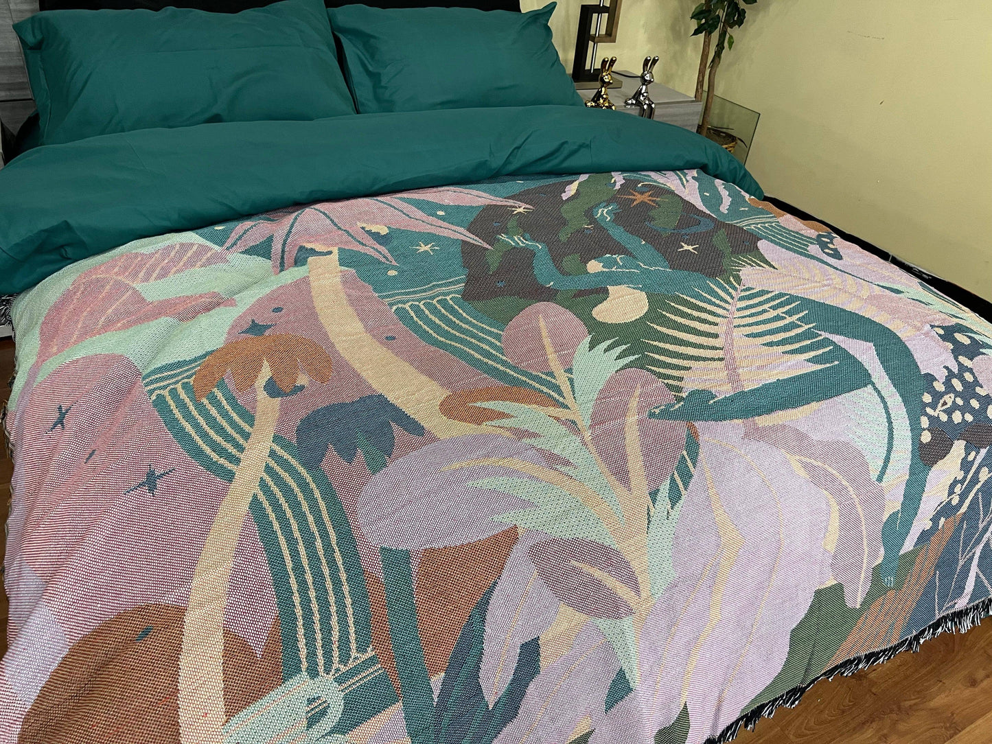 inside of Forest Dancer Throw Blanket -130x160cm Vibrant rainforest illustration with dancing woman and leopard. Lightweight and durable polyester/cotton blend.