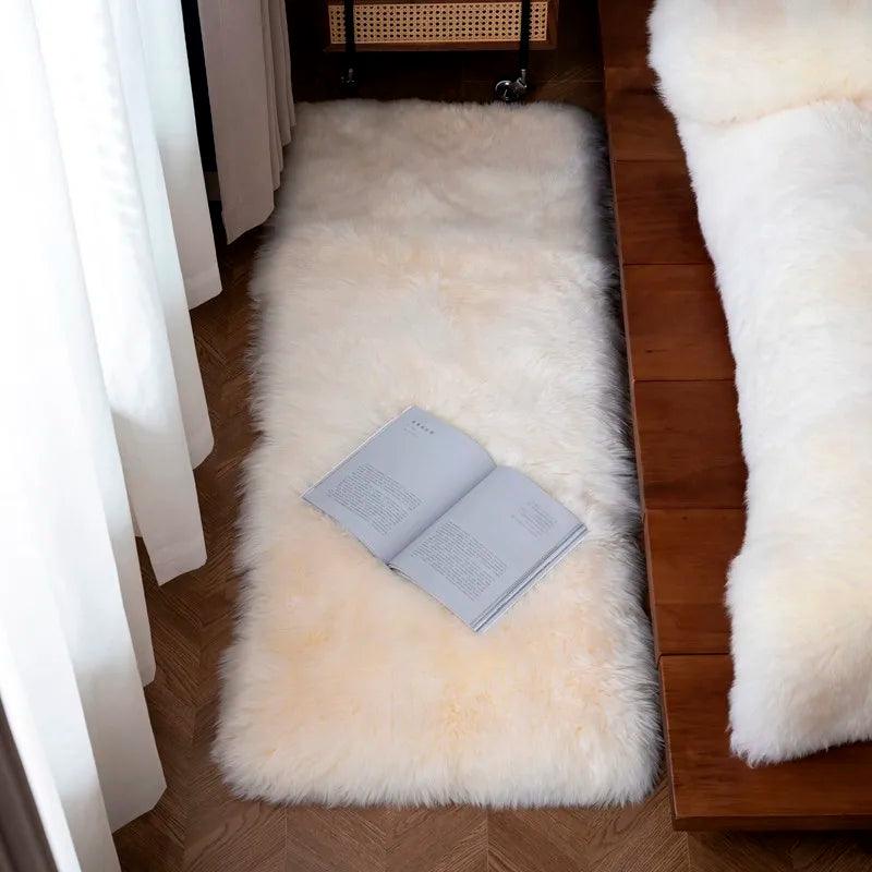 Small 24x59in heavyweight wool blanket used as rug inside of a bedroom 