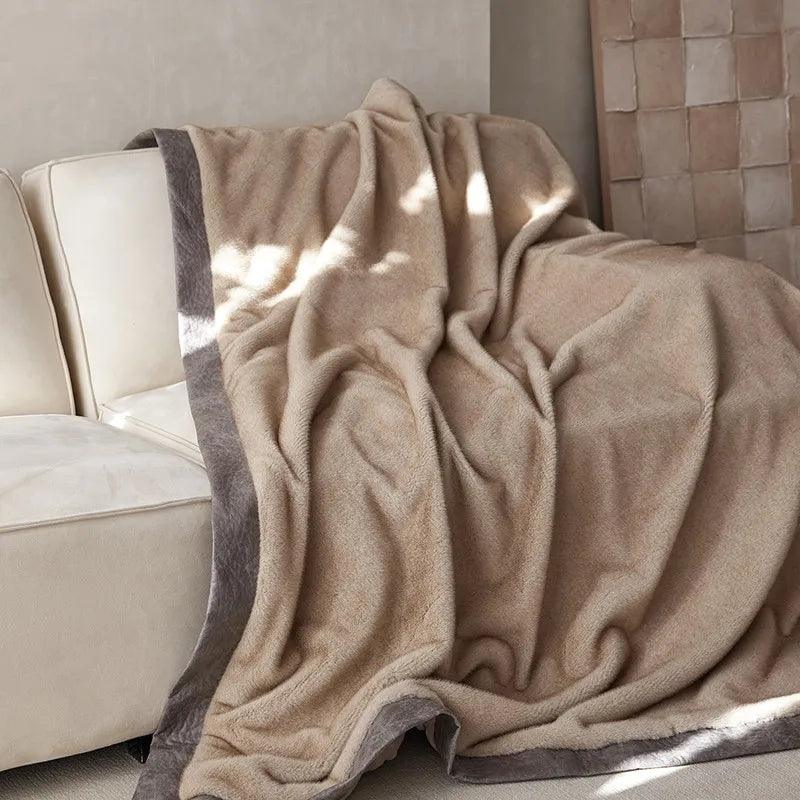 luxury brown faux mink blanket on a couch- Fluffyslip 
