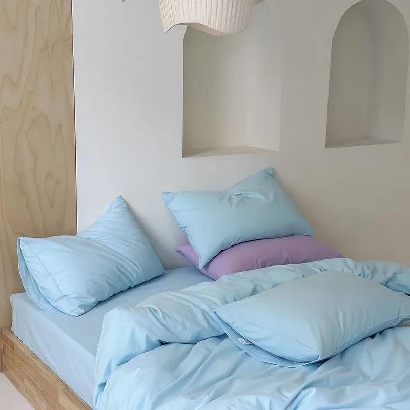 Vibrant Washed Cotton Color Duvet Cover Set in baby blue in a minimalistic style bedroom - Fluffyslip